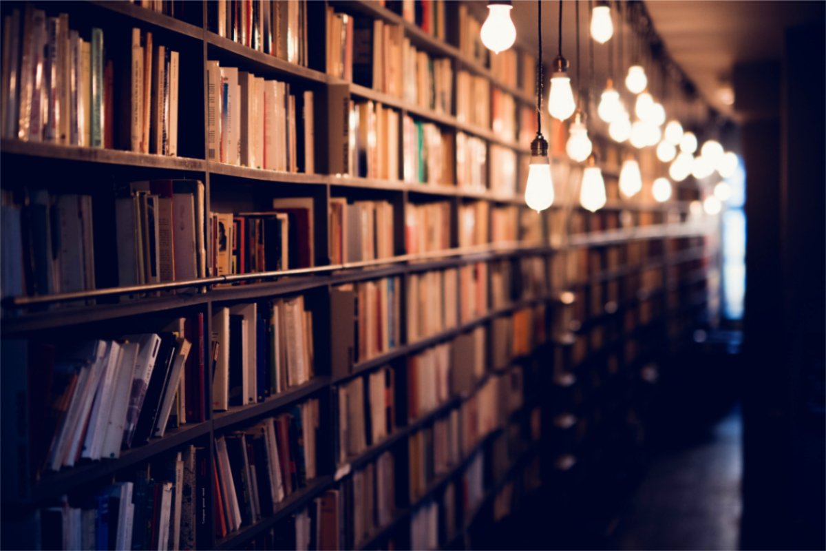 photograph of rows of books in a library by janko-ferlic-sfL_QOnmy00-unsplash